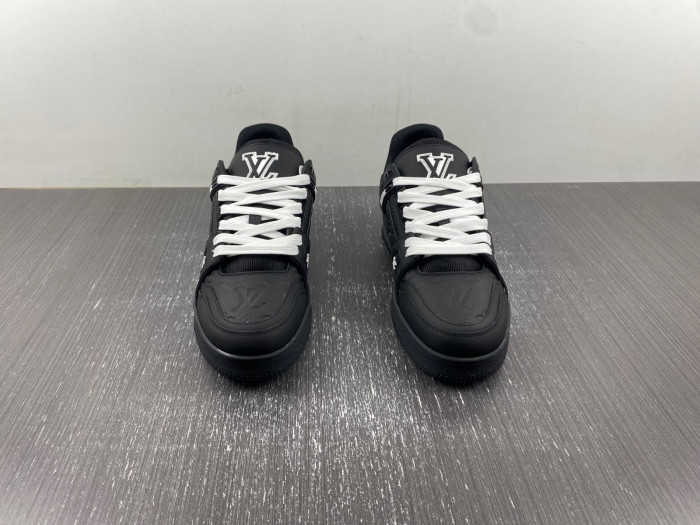 l**is V*t*n trainer all black embossing