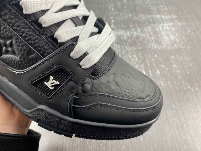 l**is V*t*n trainer all black embossing